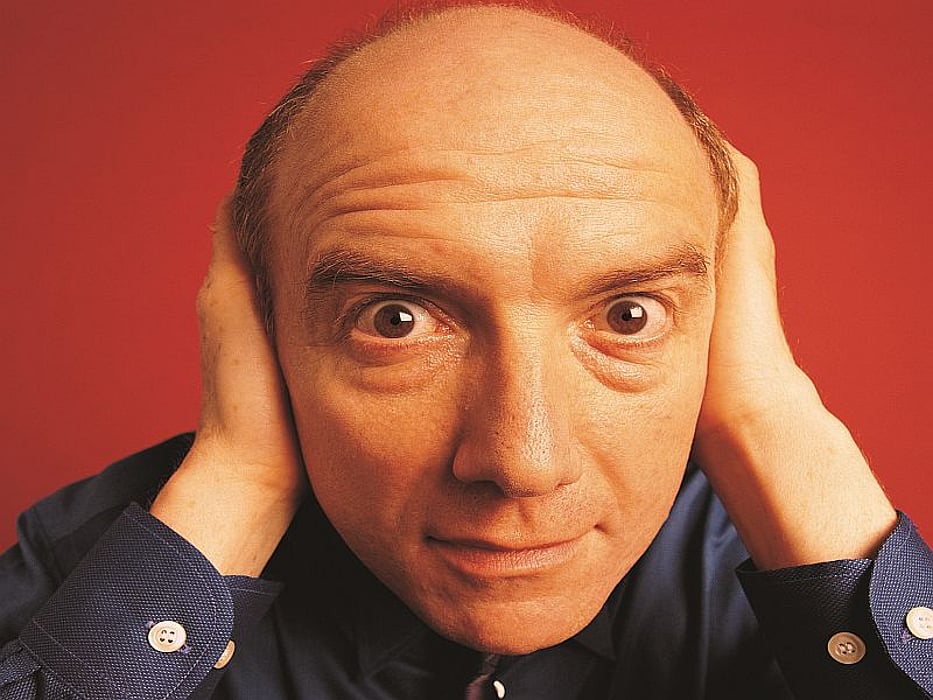 man covering ears