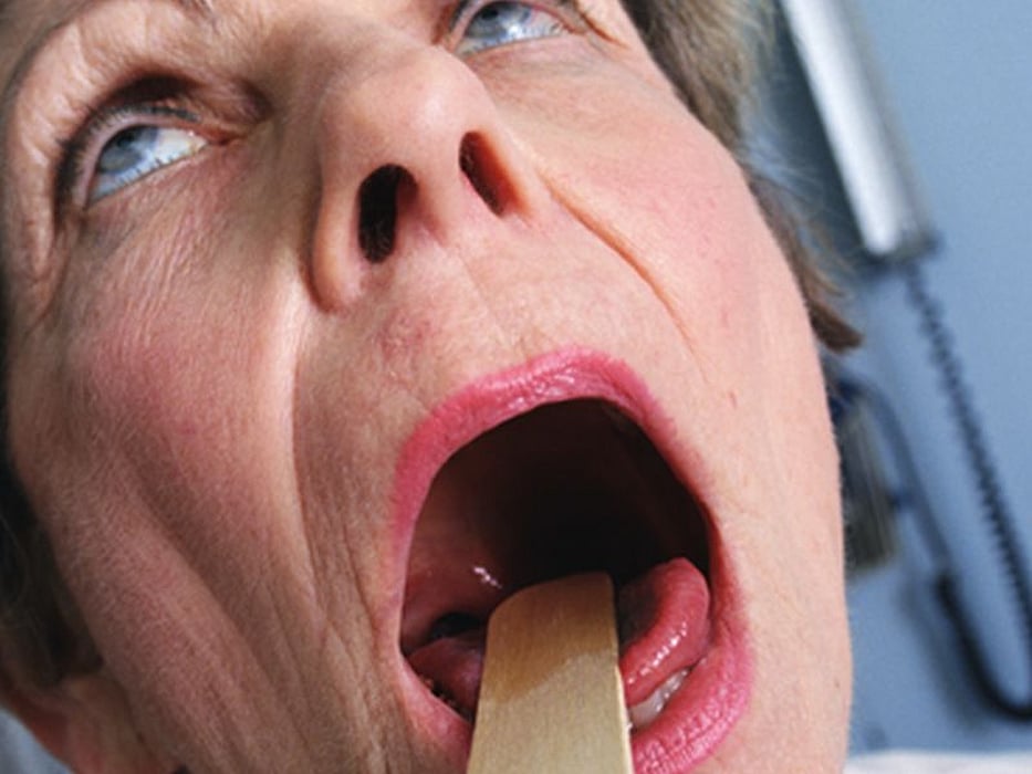 examining patient\'s throat