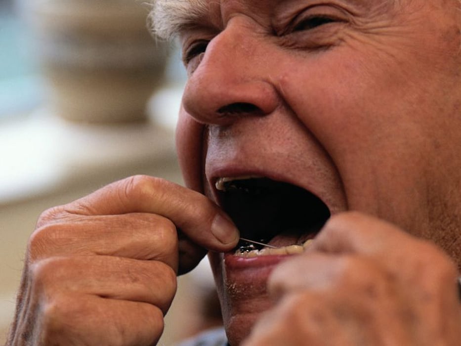 Flossing teeth