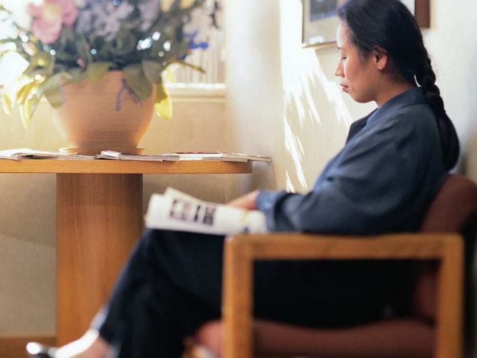 woman waiting in a medical office