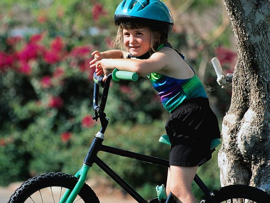 girl riding bicycle
