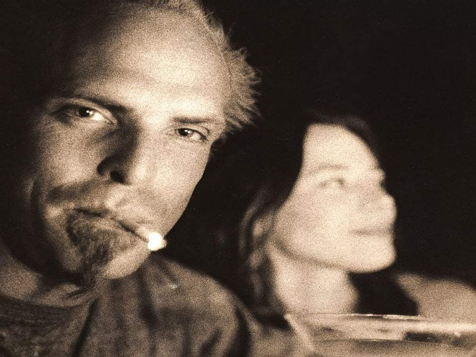 man smoking with a woman