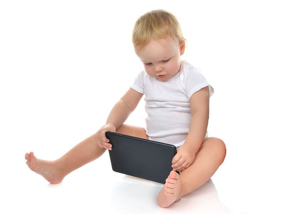 toddler with ipad