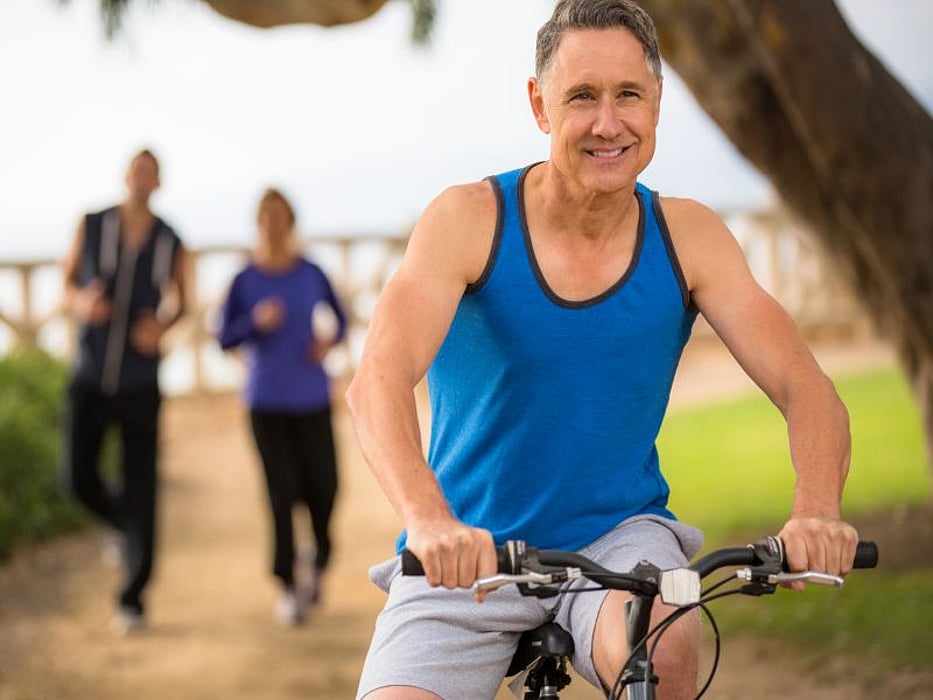 Senior man riding bicycle