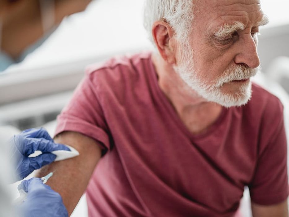 man getting vaccine