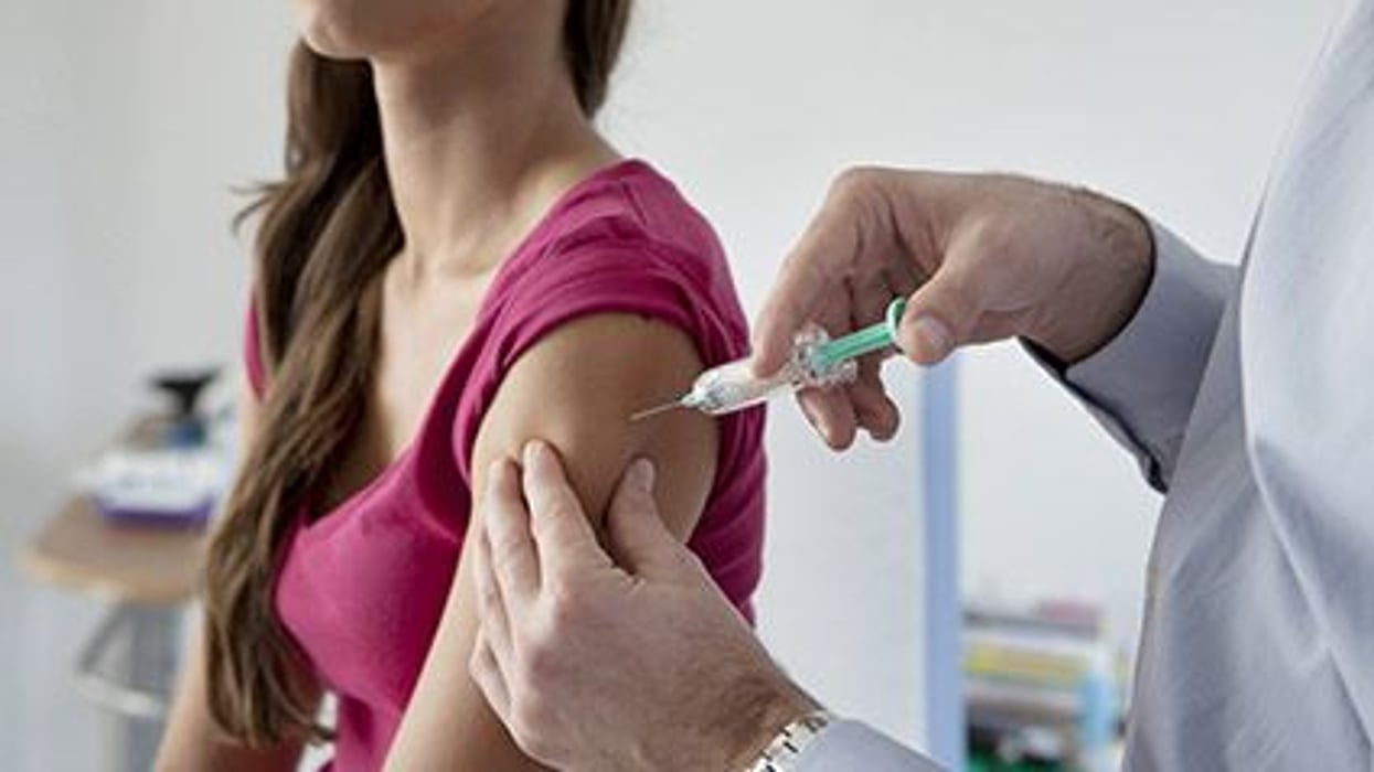 a woman getting vaccine shot