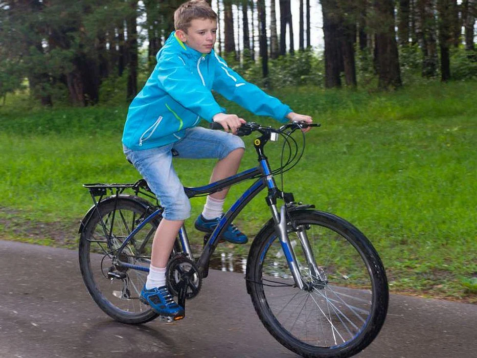 boy riding bicycle