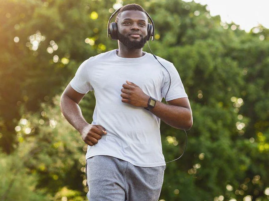 Black man jogging