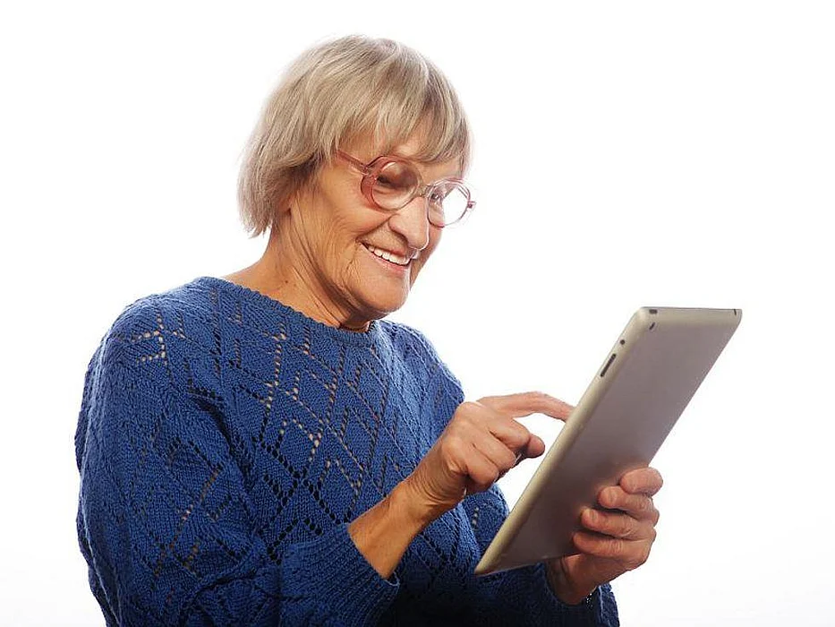 elderly woman at computer