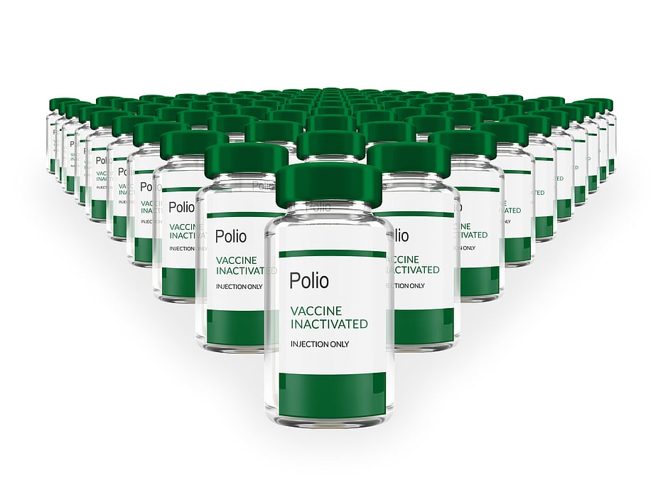 Rows of multiple Polio vaccine vials isolated on a white background. Mass production and industry concept. 3d rendering.