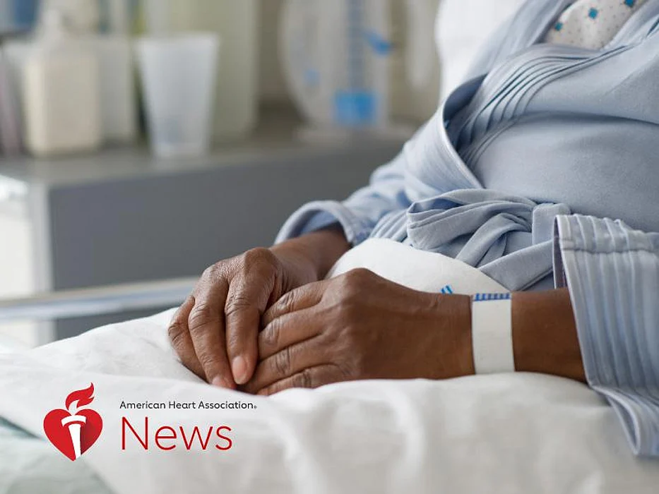 The hands of a patient with the label: American Heart Association News