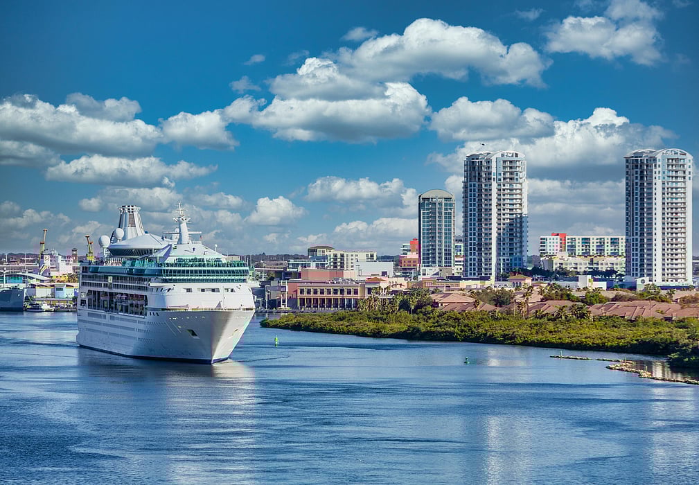 cruise ship leaves harbor during covid pandemic