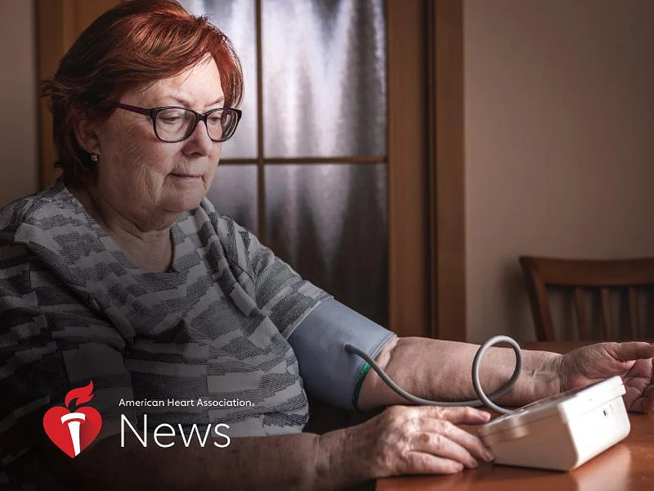 Woman taking her own blood pressure