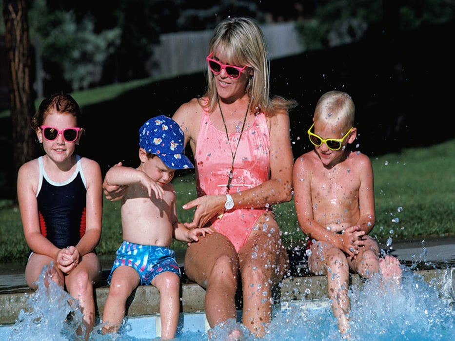 mom and kids at the swimming pool