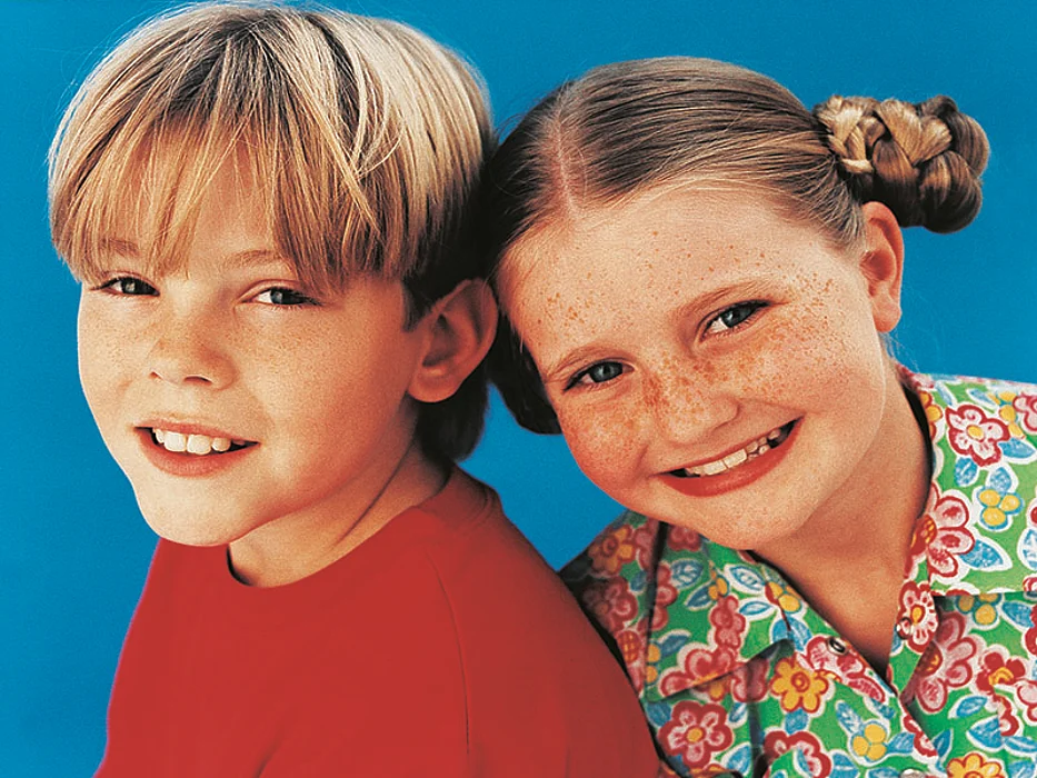 a boy and a girl smiling