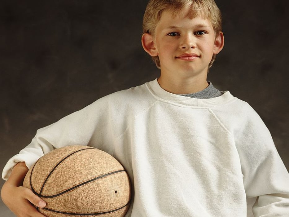 a boy with a basketball