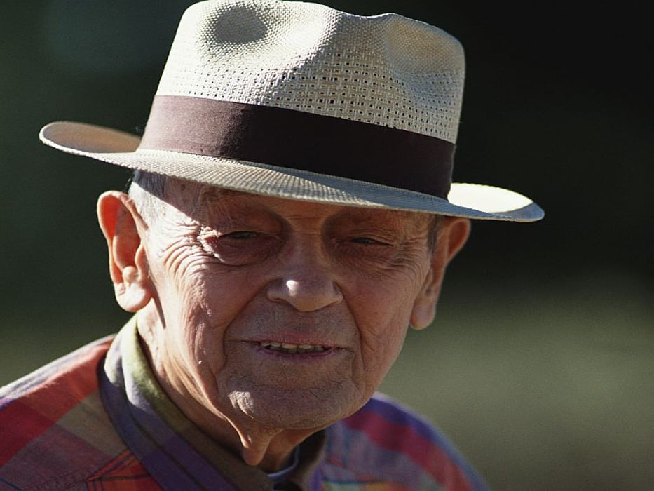 older man in a hat