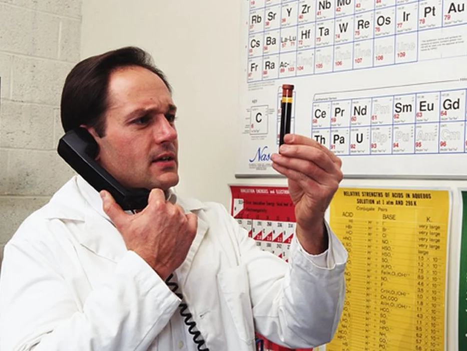 doctor looking at the blood sample
