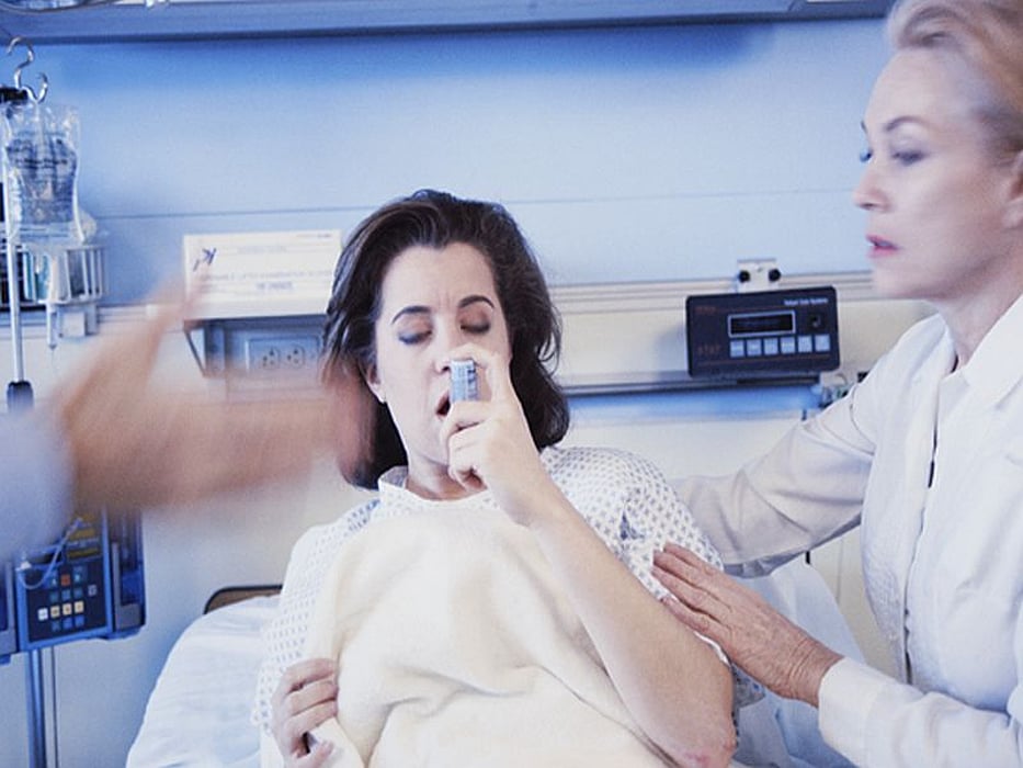 using asthma inhaler