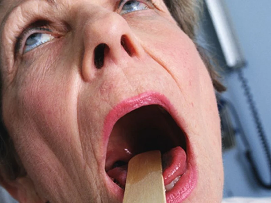 examining patient\'s throat
