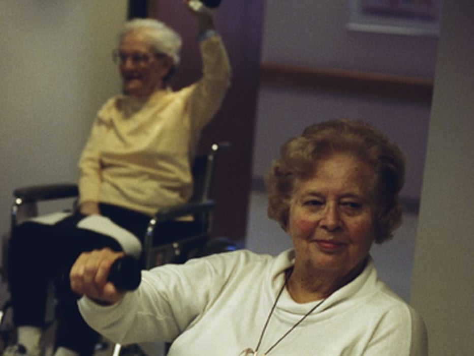elderly women getting physical therapy