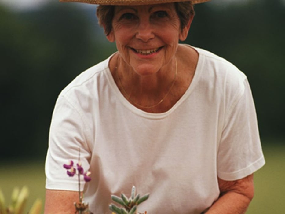 older woman gardening