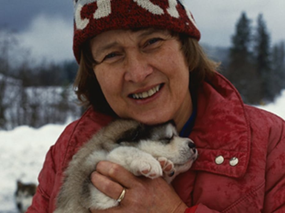 woman with a dog during the winter