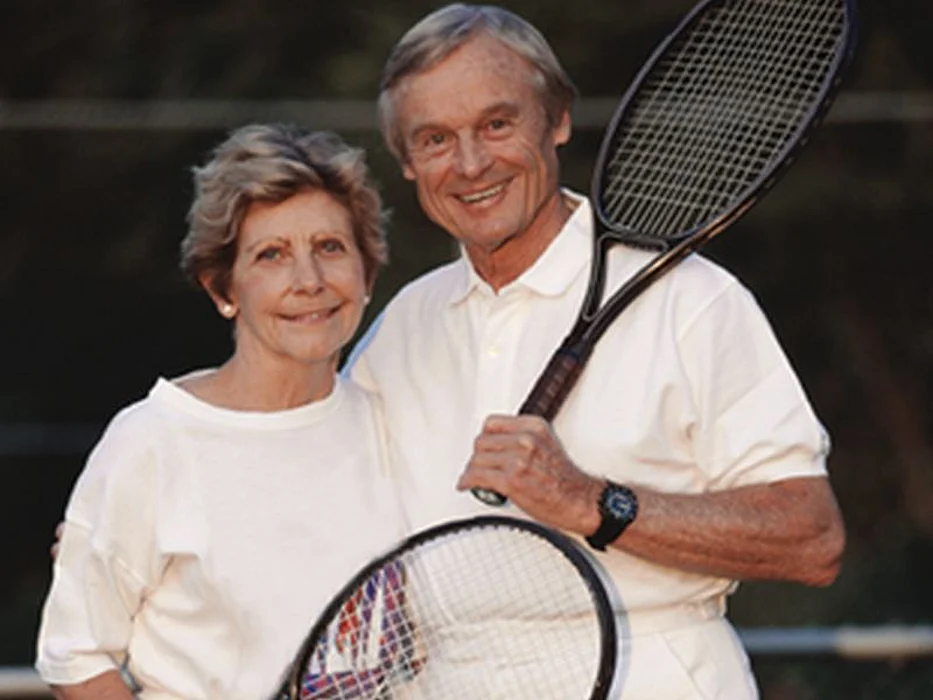 couple with tennis rackets