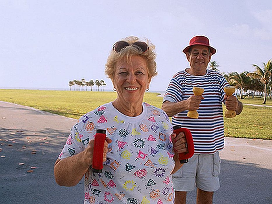 elderly couple walking