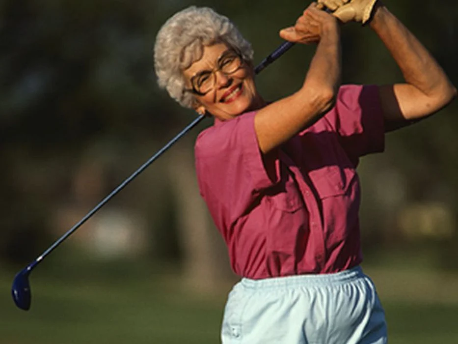 woman playing golf