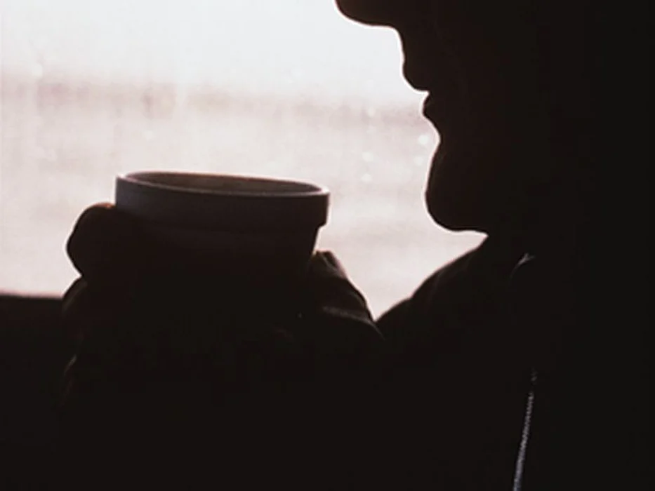 man drinking coffee
