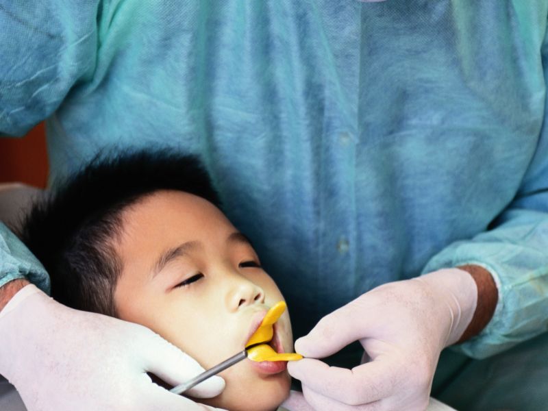 School Dental Care Program Could Cut Cavities in Half: Study