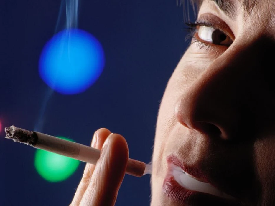 person smoking cigarette