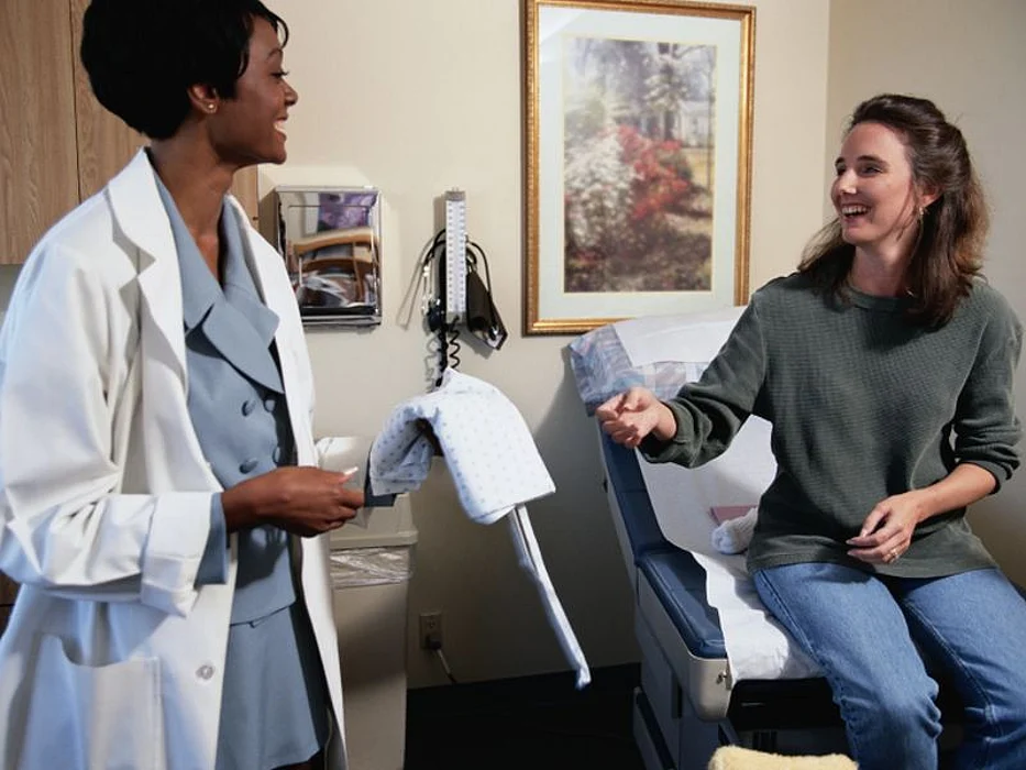 patient with a doctor in the office