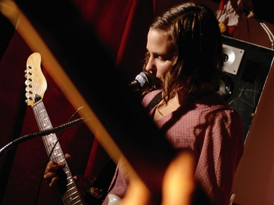 man playing a guitar