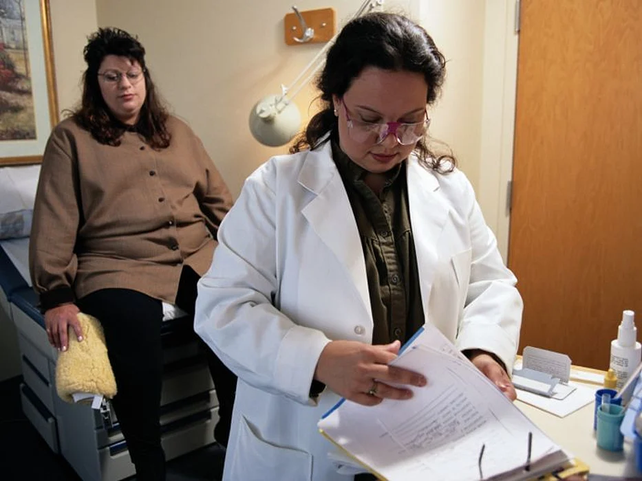 patient and a doctor in the office