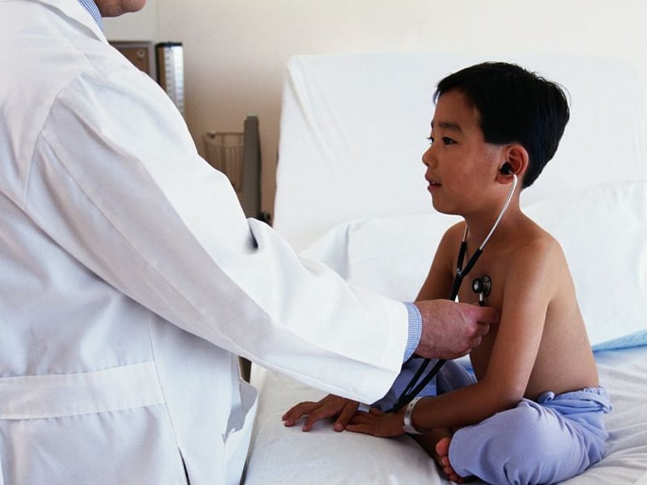 a child boy during an exam in a hospital