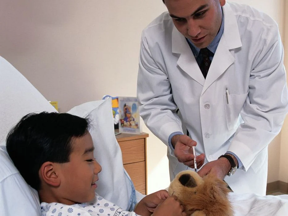 a doctor and a child in a hospital