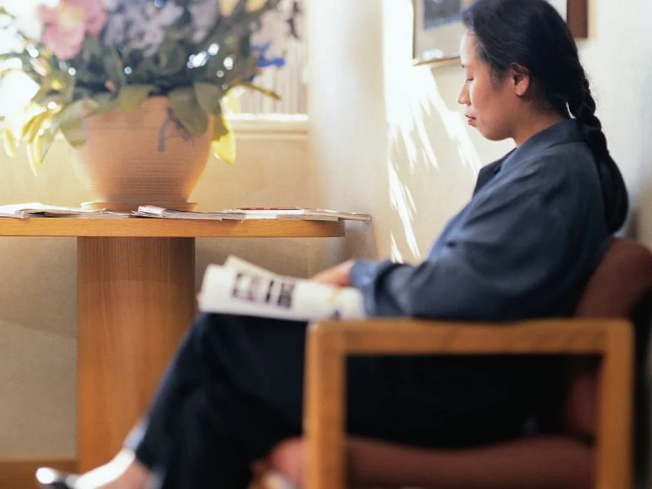 woman waiting in a medical office