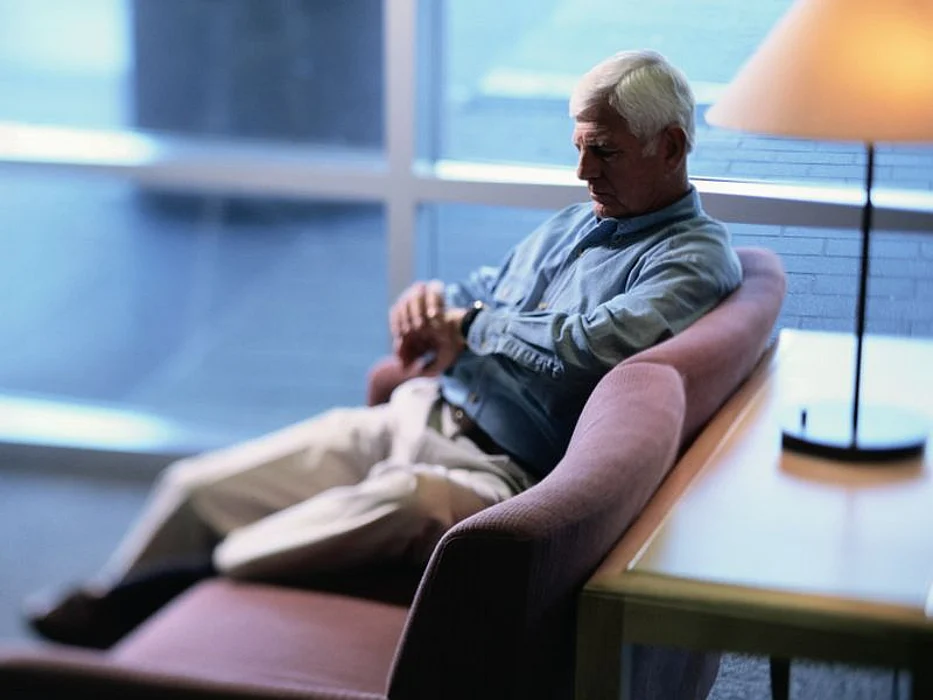 man waiting in a medical office