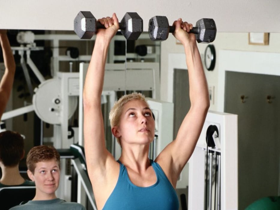 woman lifting weights