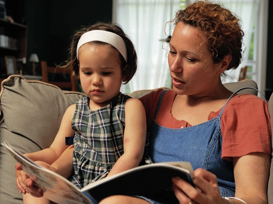 mother reading to a child
