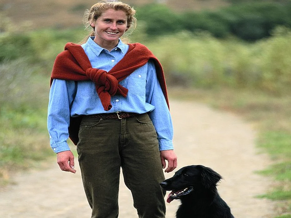 woman walking with a dog