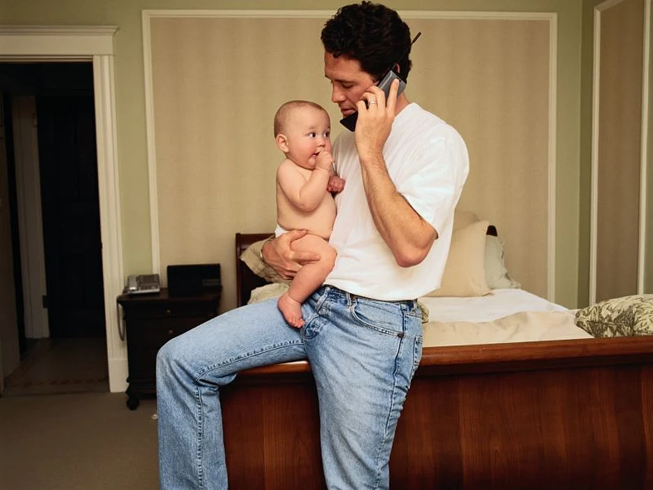 man with a baby