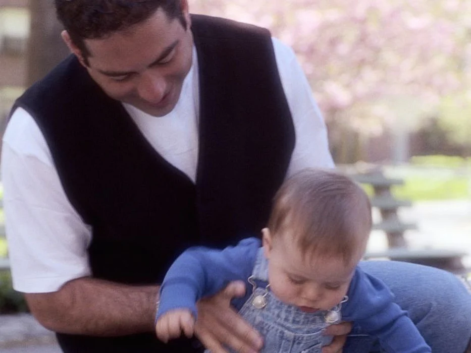 man with a baby