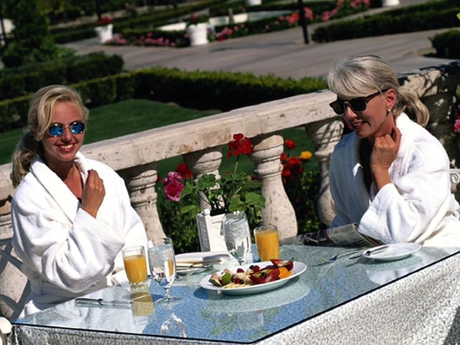 women eating outdoors