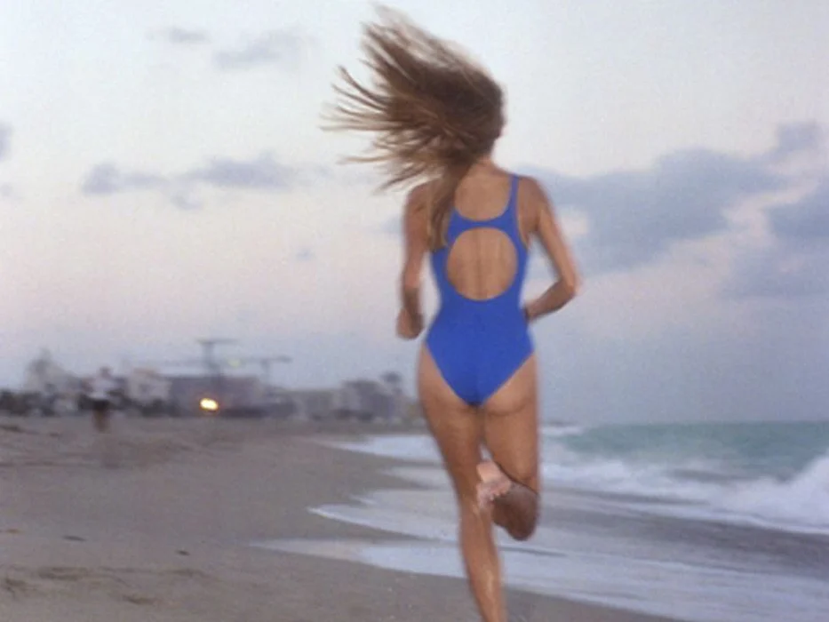 woman running at the seashore