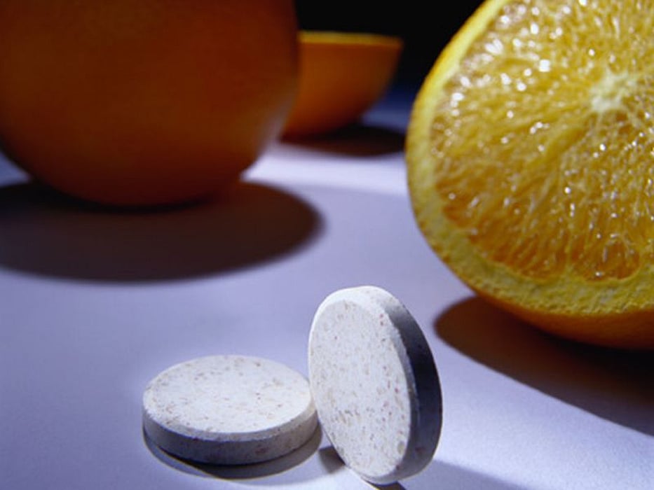 pills and an orange