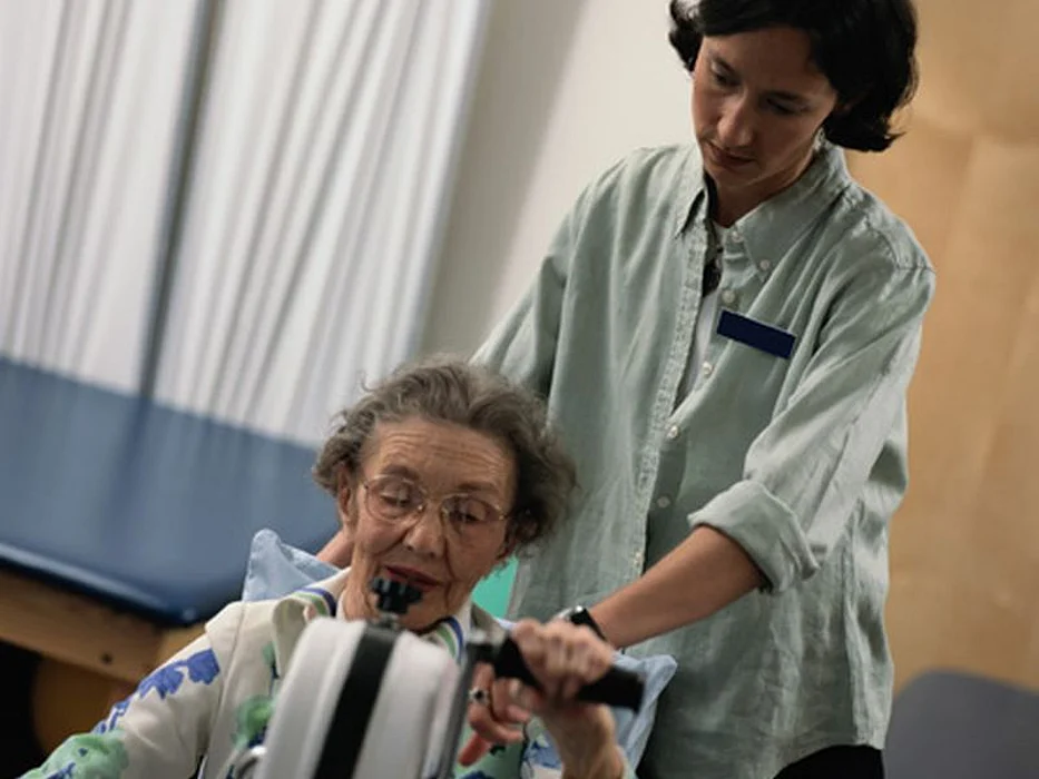 elderly woman in physical therapy