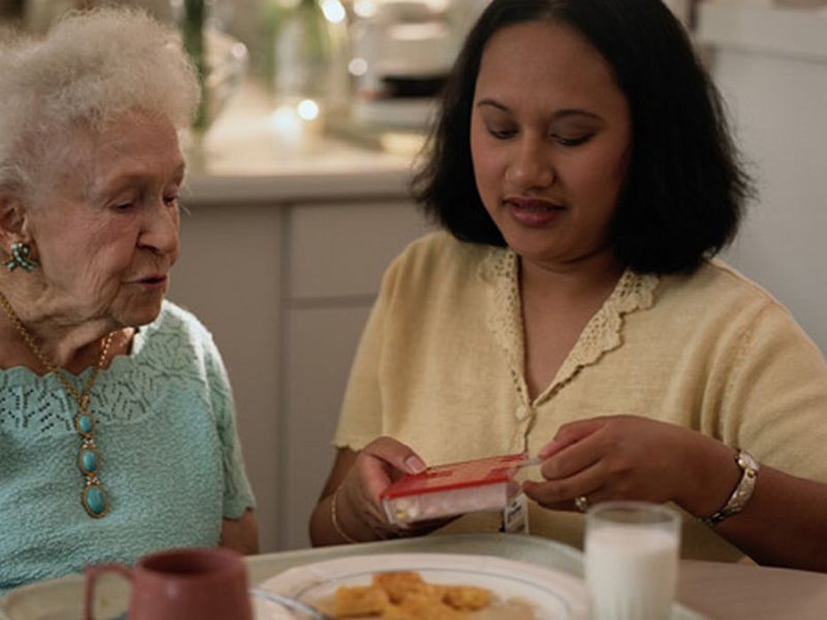 elderly woman and caregiver
